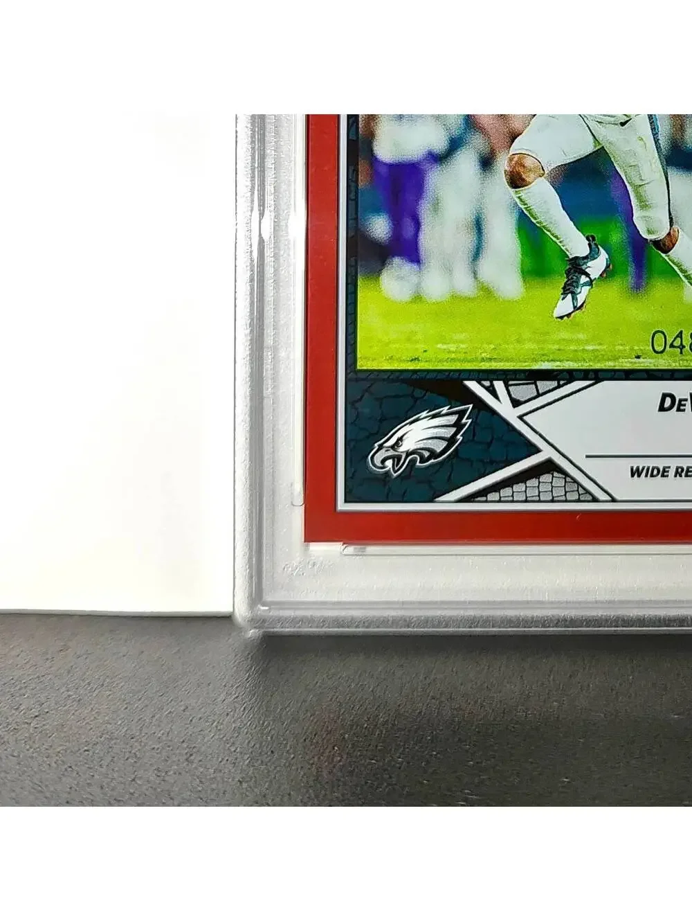 DeVonta Smith 2024 Panini Sticker Collection 048/299 #44 Red Foil PSA 9 Mint